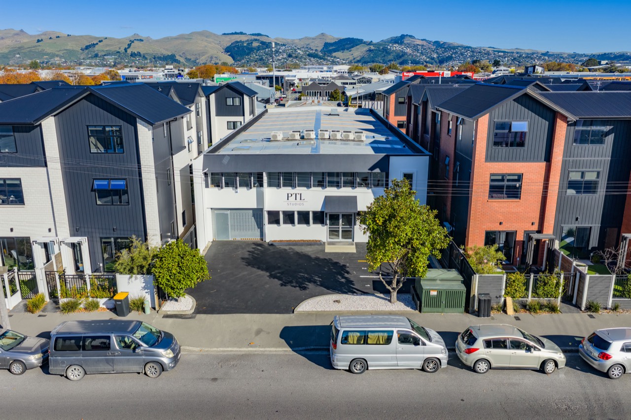 Aerial view of the PTL Studios building and its car park on Cashel Street